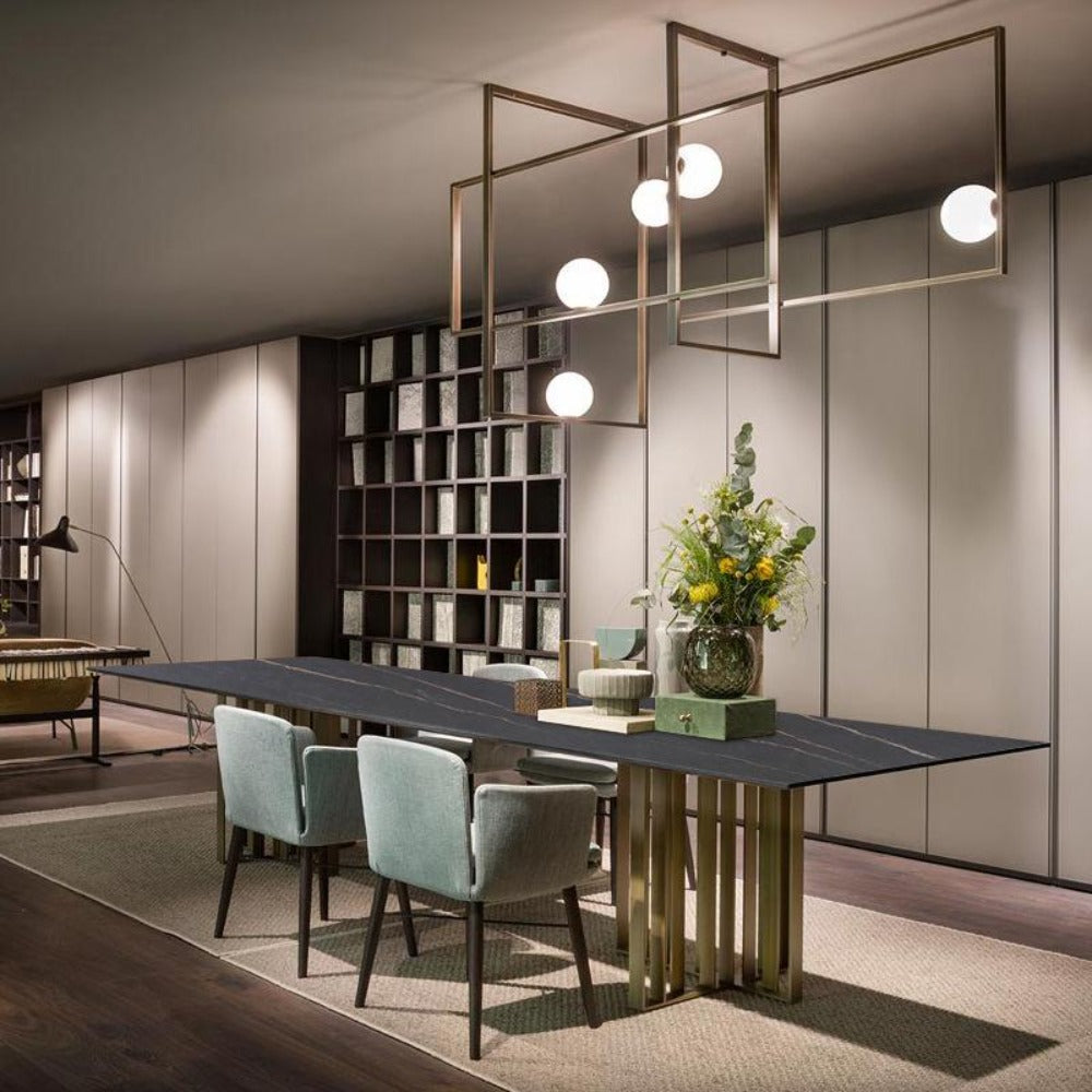 Dining room with stone-top table and upholstered dining chairs