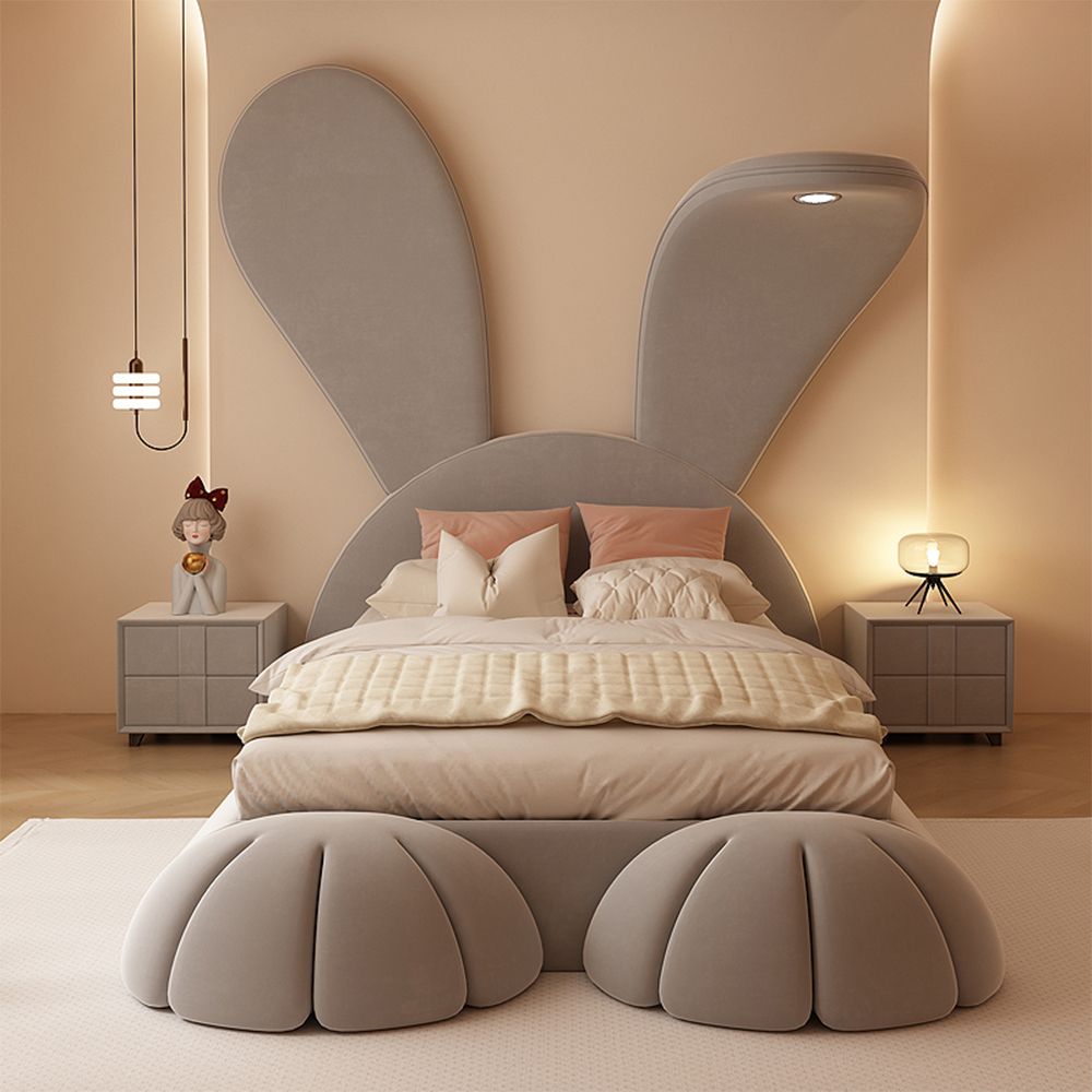 Kids bed with playful upholstered bunny headboard
